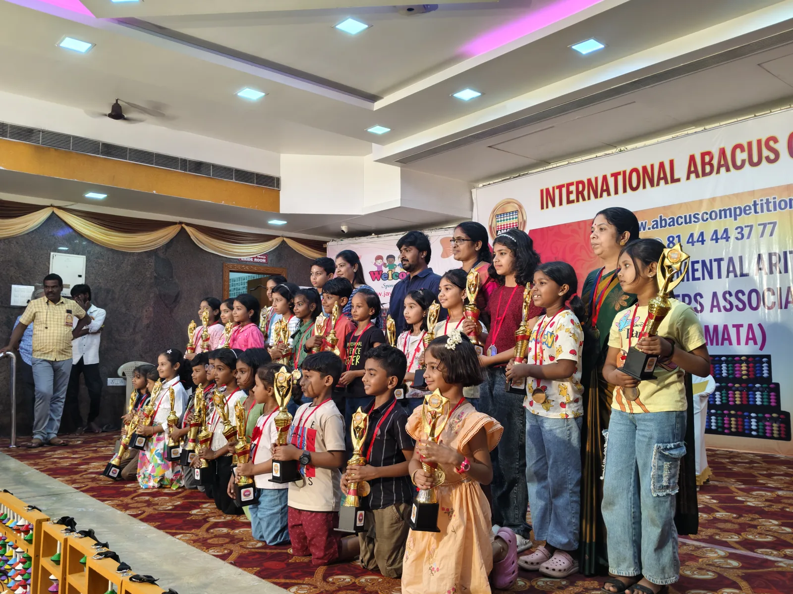 Excel Abacus students receiving recognition at an international competition